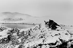 Kiska: U.S. Marines man a machine gun at a lookout post