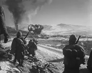 Corsairs: U.S. Marines pause at the roadblock on the way