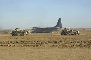 Seabees: U.S. Navy Seabees run heavy graders down ?