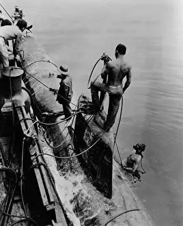 Subs: U.S. Navy tug raises one of eight Japanese midget