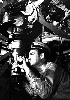 Submariner: U.S. officer at the periscope of submarine during