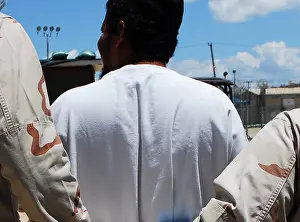 Detainee: U.S. Sailors escort a detainee to an appointment ?