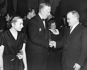 1549: U.S. Sec. of State George Marshall (center), greets