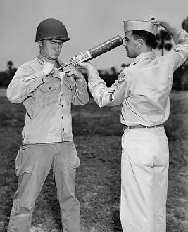 Insecticides: A U.S. soldier applying the insecticide ?