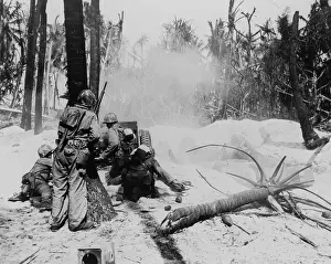 37mm: U.S. soldiers blasting some Japanese out of a