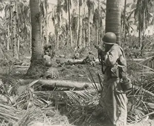 Leyte: U.S. soldiers pinned down by a enemy machine gun