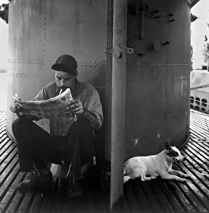 Submariners: U.S. submariner reading his favorite comic-strip