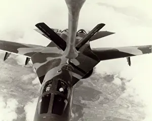 Refuels: A USAF General Dynamics F-111E refuels