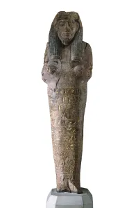 Engrave: Ushabti with inscriptions. 1554 BC. Polychrome