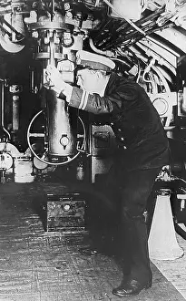 Periscope: Using the periscope in a British submarine probably 1930s