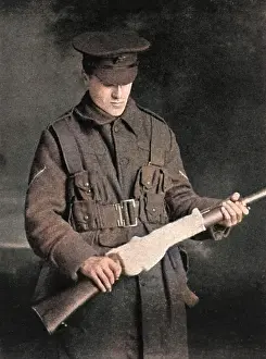 Upkeep: Using socks to keep rifles in working order, WW1