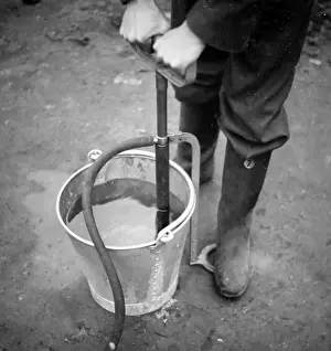 Stirrup: Using a stirrup pump, ARP training exercise during WW2