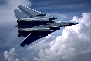Tomcat: Usn F-14 Tomcat Flying Over Clouds
