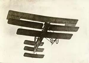 Triplane: A V Roe flying his Roe III Triplane (35hp JAP engine)