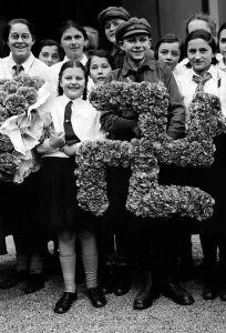 Upbringing: Various swastikas made of cornflower, 1934