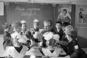 Sverdlovsk: Vasily Blyukher's son with first grade students, 1987