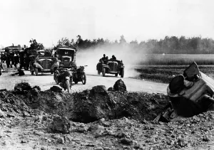 Partially: Vehicles of the Wehrmacht on a route of advance on the