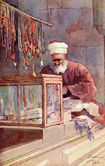 Odds: Vendor of Turkish chaplets in a Bazaar