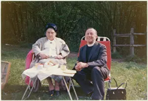 Vicar: Vicar and elderly parishioner having a picnic tea