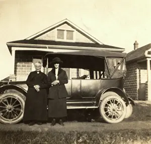 Coupole: Vicar, wife and car