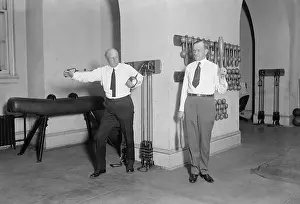 Dumbbells: Vice President Calvin Coolidge working out with