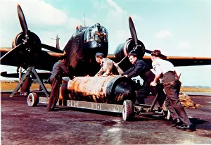 The Hugh W. Cowin Aviation Collection: Vickers Wellington IC -seen being bombed up