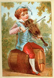 Victorian boy violinist sitting on a barrel