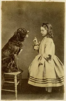Ringlets: Victorian girl training her dog