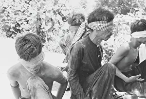Blindfold: Viet Cong prisoners captured during operations