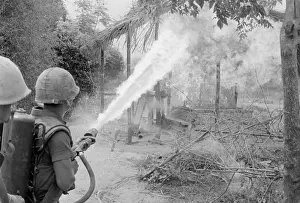 Quang: Vietnam War. US Marines set fire to the ?