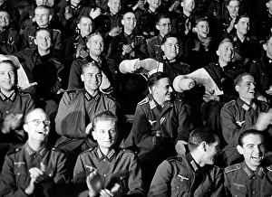 Applaud: View of the audience at an entertainment event
