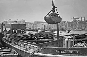 Lifebelts: View of a boat, River Thames, London