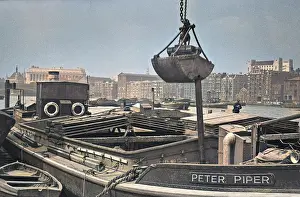 Lifebelts: View of a boat, River Thames, London