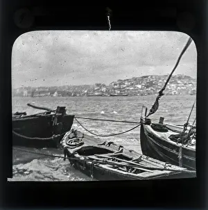 Alex Lambert Lantern Slide Collection: View of boats and Lisbon