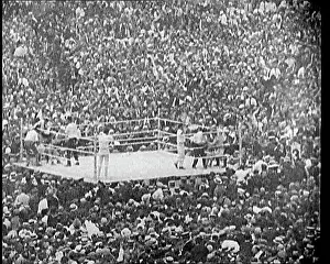 Carpentier: View of the Boxing Ring at a Crowded Sports