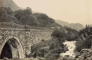 Foam: View of bridge and river, North Wales