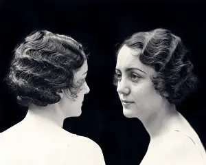 Clone: Front and Back View of Same Brunette Woman Demonstrating