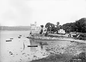 Appears: A side view of a Castle by the sea that appears to be Blackr