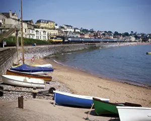 Intercity: View of cove with boats and train, Dawlish, Devon