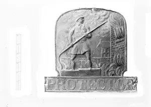 Plaque: A view of a fireman plaque entitled Protector