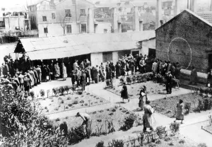 Queuing: View of a Jewish refugee camp in Shanghai, 1939-45 (b/w phot