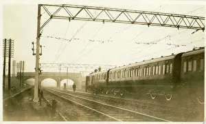 Electrification: View of passenger train on track and overhead contact