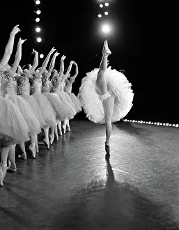 Tutus: Side view of prima ballerina in standing split