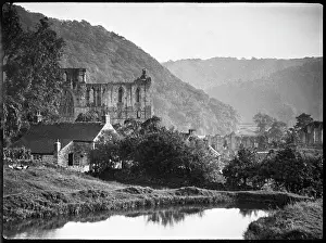 Waterscape: A view of Rievaulx Abbey with the River Rye and a cottage