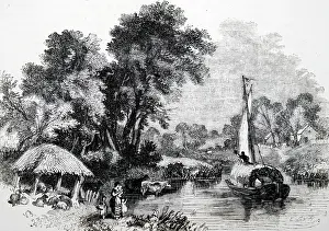 Barge: View on the River Bure on the Norfolk Broads showing