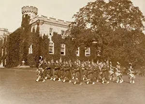 Tulloch: View of Tulloch Castle, Scotland, with pipers