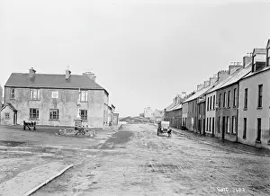 Perhaps: View of a village square, location unknown, perhaps Dunfanag