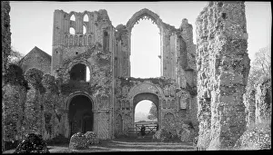 Spans: View of the west front of the Castle Acre Priory