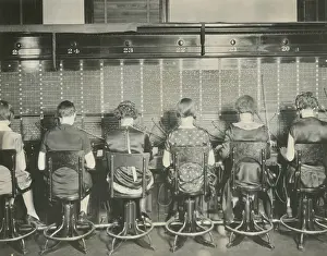 Bstp1215: Back view of young women telephone switchboard operations