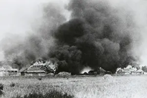 Lcgr1406: Village on the Densa River in flames during the